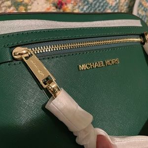 Forest green Michael Kors crossbody bag with adjustable strap
